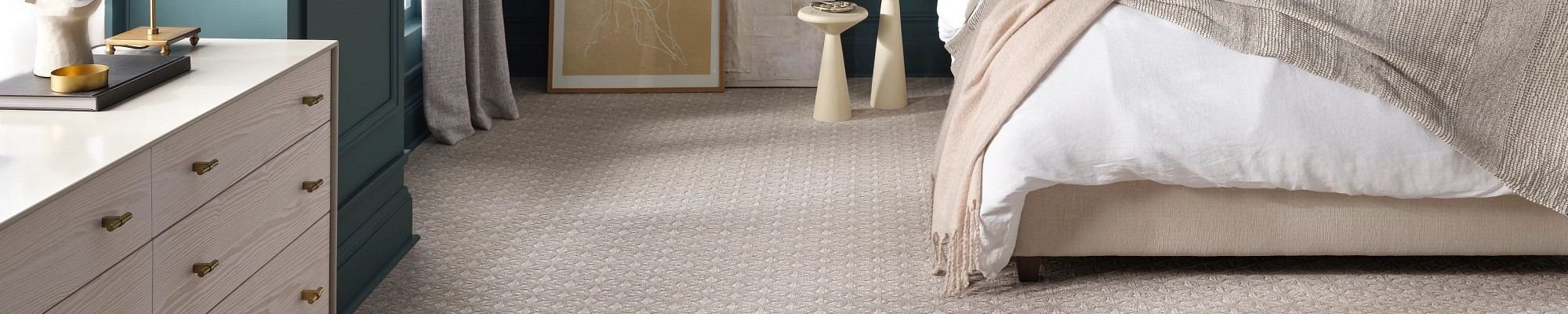 Bedroom with beige patterned carpet from Flooring Source in the Auburn, MA area